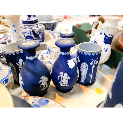 595 - 2 19th century blue Jasperware biscuit barrels; a Victorian style jug and bowl, blue and white potte... 