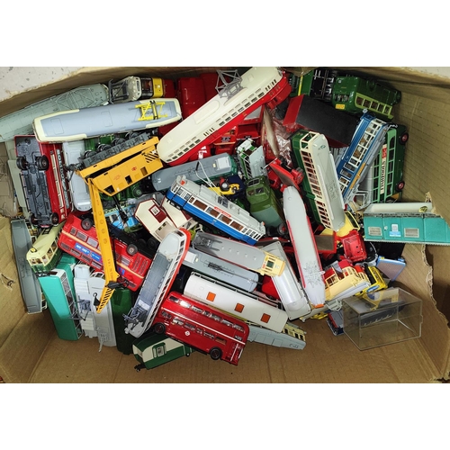 339 - A large collection of diecast trams, buses etc