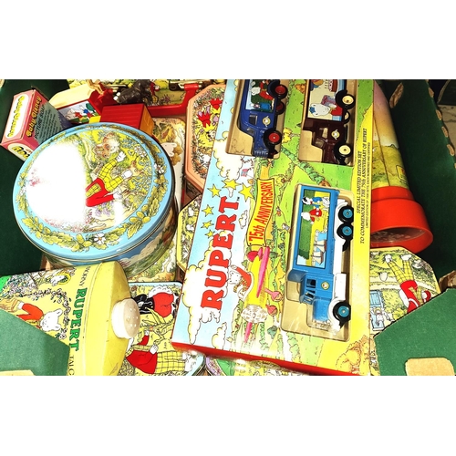 361 - A collection of vintage Rupert Bear figures, Rupert boxed cars, tins etcNo bids sold with next lot... 