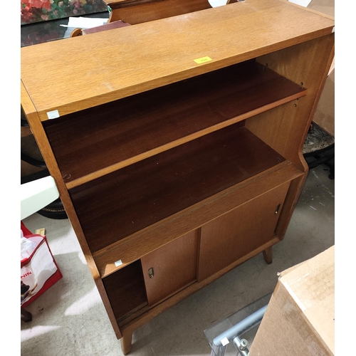 894 - A 1950's bookcase/side cabinet with open shelves and cupboard under