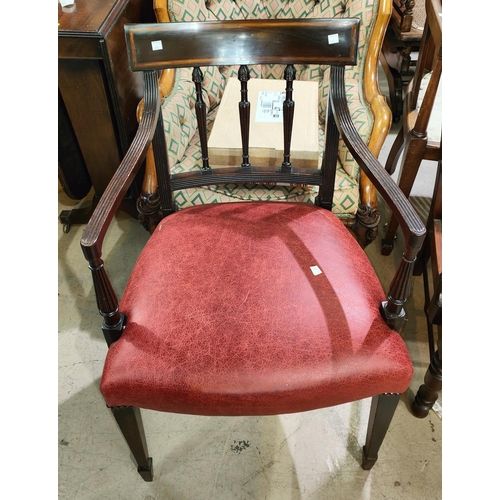 895 - A Sheraton period mahogany carver chair with satinwood crossbanding, red leather upholstery, on squa... 