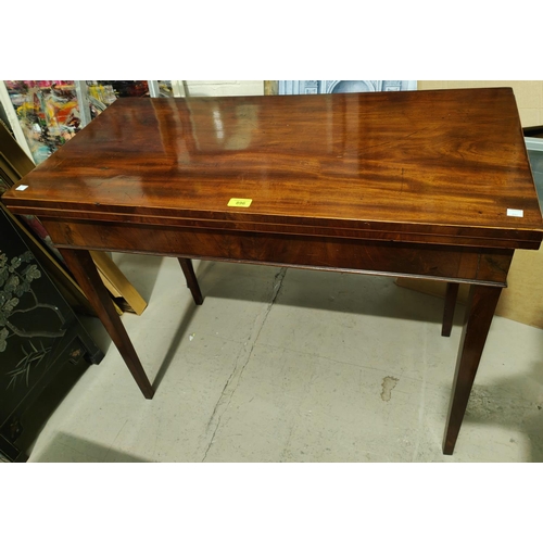 896 - A 19th century Sheraton style mahogany side table, the rectangular fold-over top with boxwood line i... 