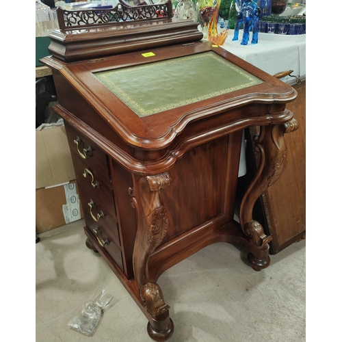 944 - A reproduction mahogany Davenport desk