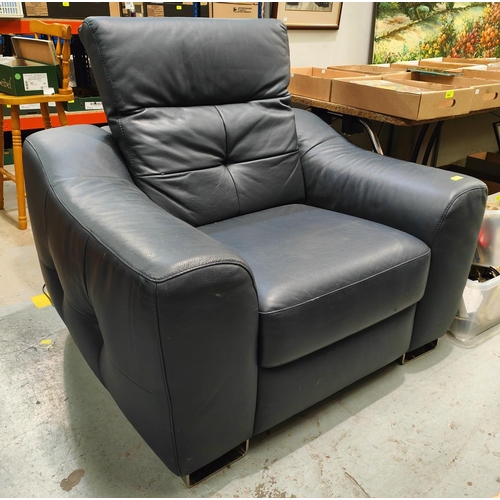 974 - A large and stylish blue leather 'Love Seat' chair with chrome feet, Italian style.