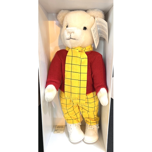 306 - A Merrythought Rupert Bear with original tag and box, red jumper, yellow & black trousers & ... 