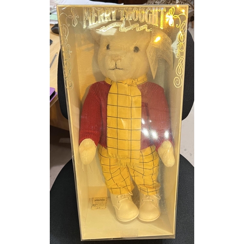 306 - A Merrythought Rupert Bear with original tag and box, red jumper, yellow & black trousers & ... 