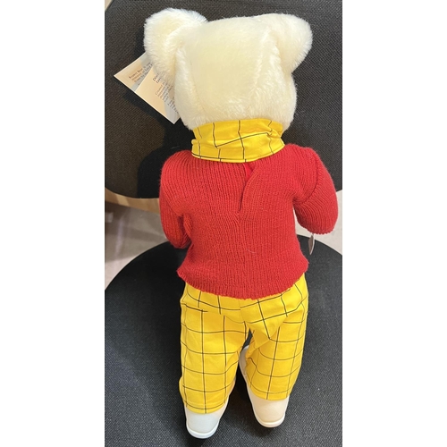 306 - A Merrythought Rupert Bear with original tag and box, red jumper, yellow & black trousers & ... 