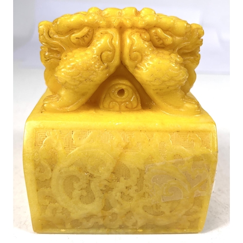 509A - A large Chinese Republic period Imperial yellow heavily carved soapstone seal depicting mythical ani... 