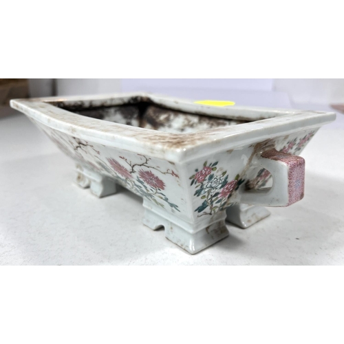 519A - A Chinese ceramic famille rose planter with floral decoration, length 27cm