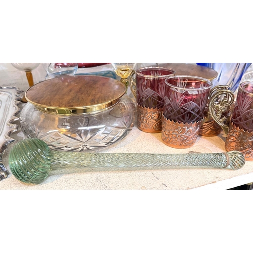 574 - Copper and cranberry glass drinking cups, 4 with dishes, two others no glass and a selection of glas... 