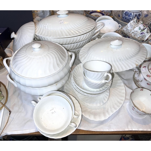 594G - A Wedgwood plain white spiral fluted part dinner service (approx. 25pc)