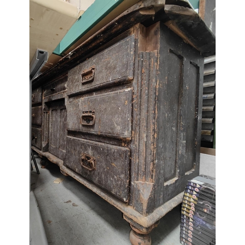 970 - A 19th century stained pine dresser made of 7 drawers & central cupboard (recently used as a wor... 