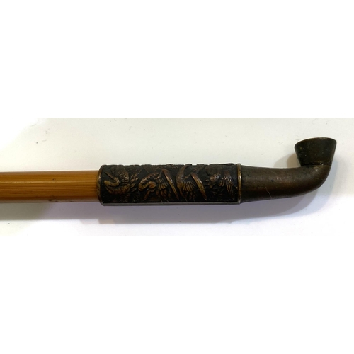 531 - A Chinese bamboo and brass pipe