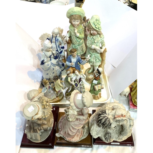 573A - A selection of Capodimonte Armani figures of children and animals: five resin groups and a selection... 