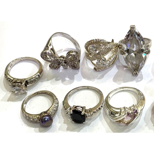 729B - A selection of 10 fancy stone set silver rings all hallmarked or stamped 925, 64gms