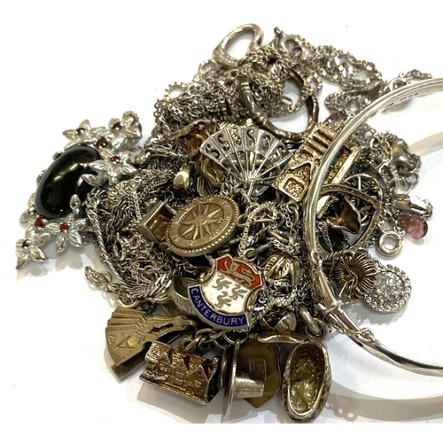 729C - A selection of silver/white metal chains, bangle, charm bracelet etc, 127gm