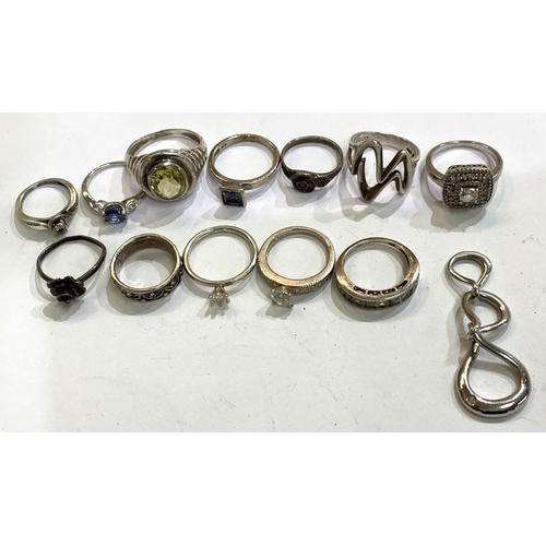 730A - A selection of silver stone set and other rings, 53gms