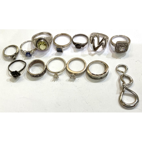 730A - A selection of silver stone set and other rings, 53gms