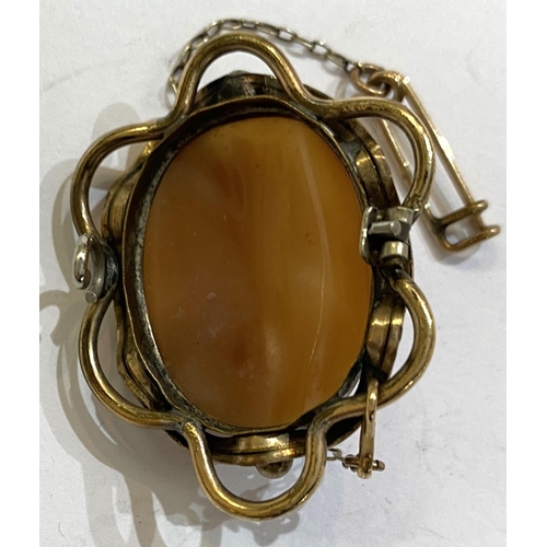 767A - An oval female head cameo in an ornate gilt metal surround (pin missing); a white metal bar brooch w... 