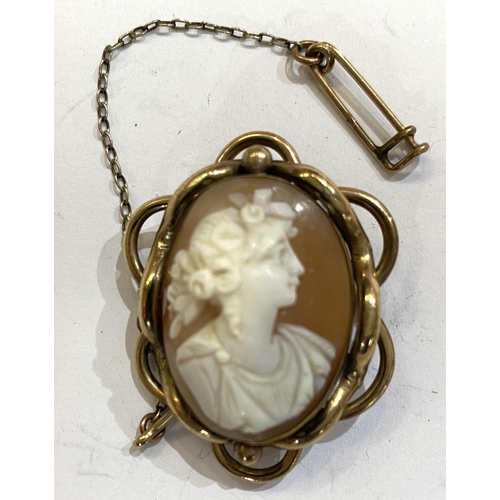 767A - An oval female head cameo in an ornate gilt metal surround (pin missing); a white metal bar brooch w... 