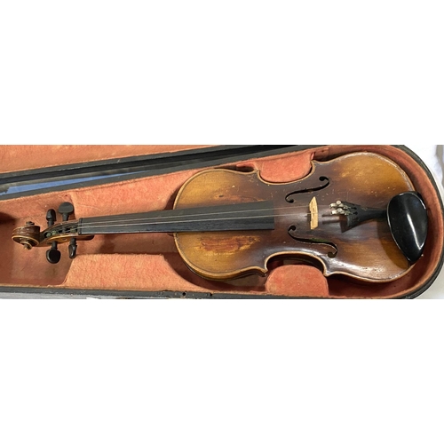 31 - A late 19th/ early 20th century two piece back violin in hard case (splits to body)