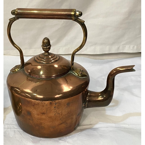 38 - A 19th century copper kettle; a 19th century school bell