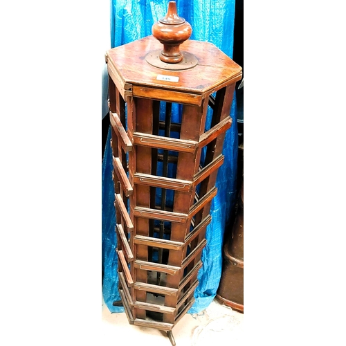 149 - An Edwardian wooden rotating postcard display rack, six sided, ht. 104cm