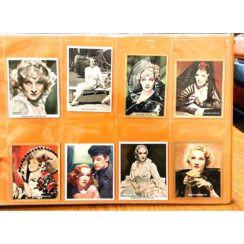 151 - Two albums containing a collection of cards; etc., relating to Marlene Dietrich, one 15 pages, one 2... 