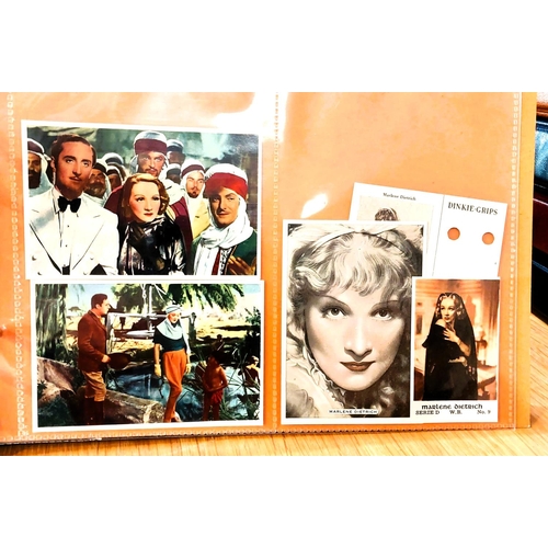 151 - Two albums containing a collection of cards; etc., relating to Marlene Dietrich, one 15 pages, one 2... 