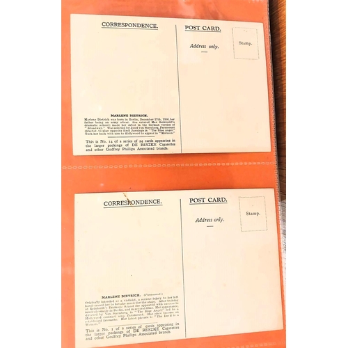 151 - Two albums containing a collection of cards; etc., relating to Marlene Dietrich, one 15 pages, one 2... 