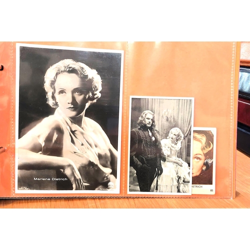 151 - Two albums containing a collection of cards; etc., relating to Marlene Dietrich, one 15 pages, one 2... 