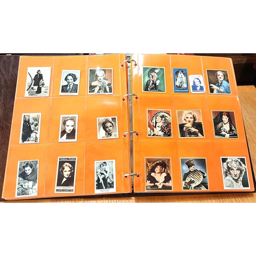 151 - Two albums containing a collection of cards; etc., relating to Marlene Dietrich, one 15 pages, one 2... 