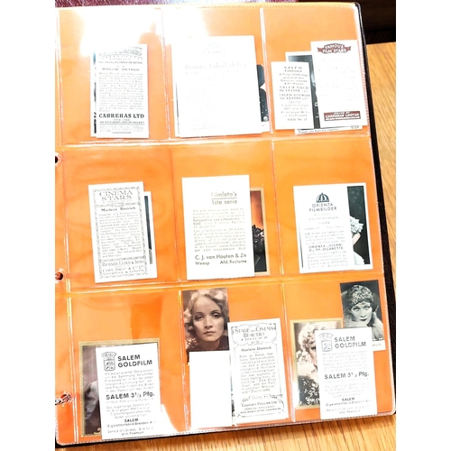 151 - Two albums containing a collection of cards; etc., relating to Marlene Dietrich, one 15 pages, one 2... 