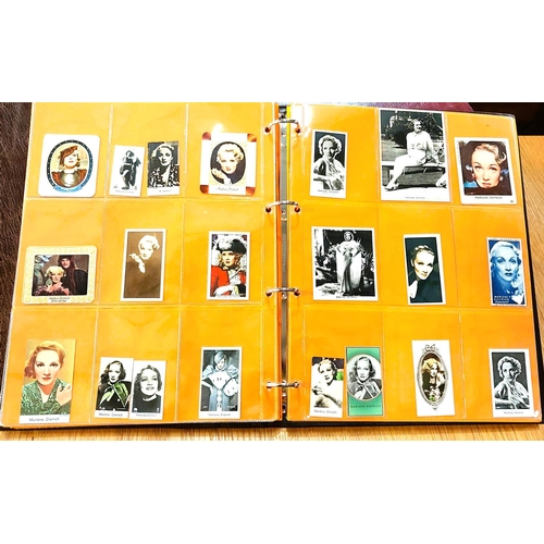 151 - Two albums containing a collection of cards; etc., relating to Marlene Dietrich, one 15 pages, one 2... 