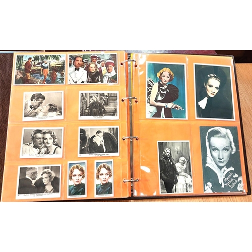 151 - Two albums containing a collection of cards; etc., relating to Marlene Dietrich, one 15 pages, one 2... 