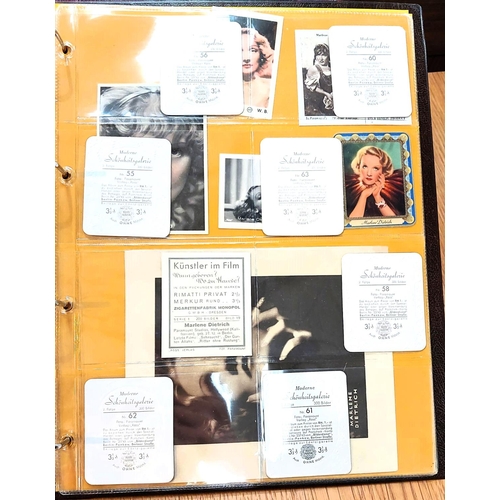 151 - Two albums containing a collection of cards; etc., relating to Marlene Dietrich, one 15 pages, one 2... 