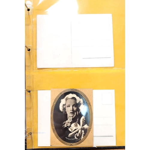 151 - Two albums containing a collection of cards; etc., relating to Marlene Dietrich, one 15 pages, one 2... 