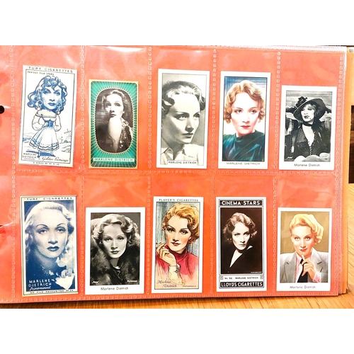 151 - Two albums containing a collection of cards; etc., relating to Marlene Dietrich, one 15 pages, one 2... 