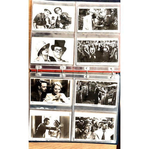 153 - Two albums of postcards relating to 20th century film stars:  Film Weekly & Film Shots, 163 appr... 