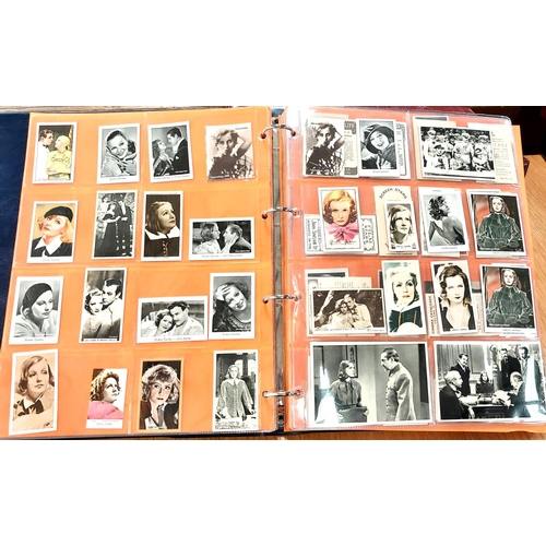 154 - An album of publicity shots, etc., relating to early/mid 20th century film stars; a similar album de... 