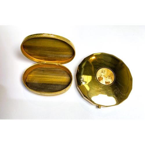 755A - A Gwenda Top Flap compact with Kingfisher enamel top; a gilt compact; a Tiger's Eye pill box; a gilt... 