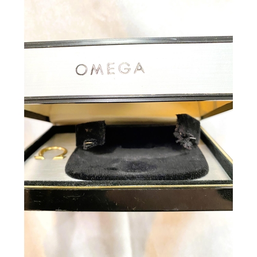 760 - An Omega watch box issued to commemorate the 1968 Mexico Olympic Games.