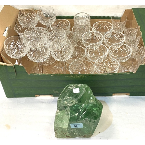 50 - A green glass paperweight/doorstop and a selection of various drinking glasses