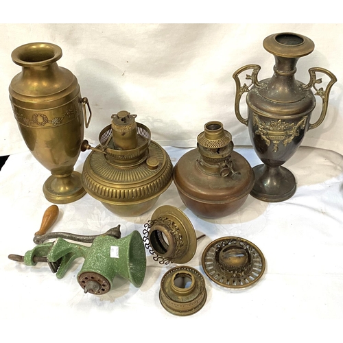 51 - Two brass reservoirs for Victorian oil lamps; a pair of brass vases; a vintage mincing machine