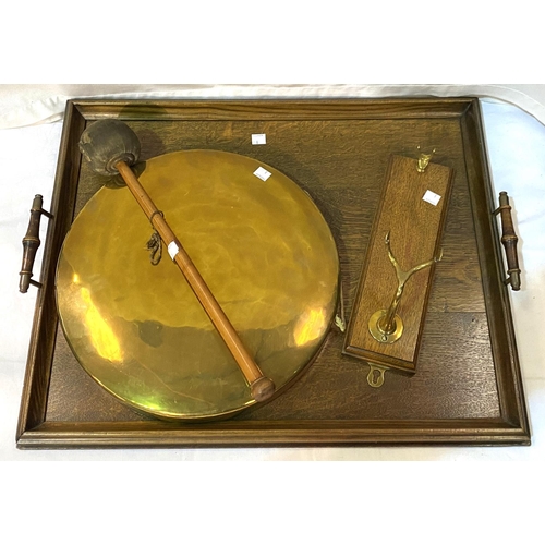 8 - A brass wall mounted gong; a coat hook; a 1930's oak tray