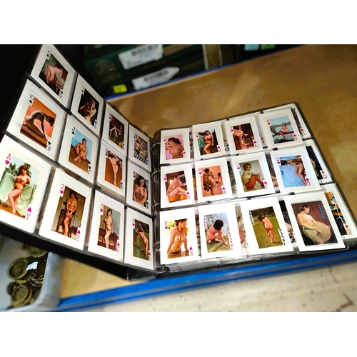 148 - A large folder of vintage pin up and glamour nude playing cards