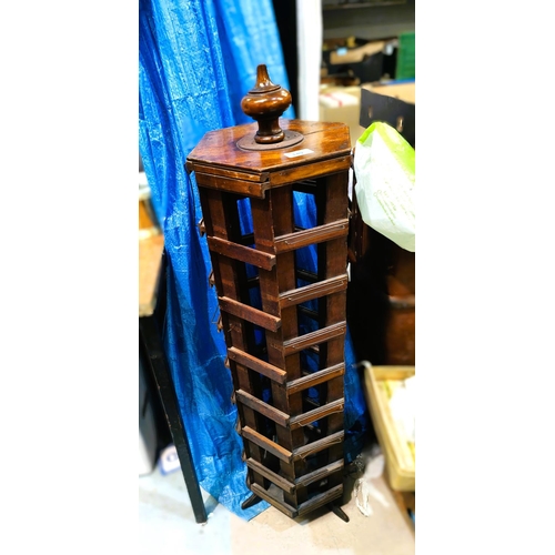 149 - An Edwardian wooden rotating postcard display rack, six sided, ht. 104cm