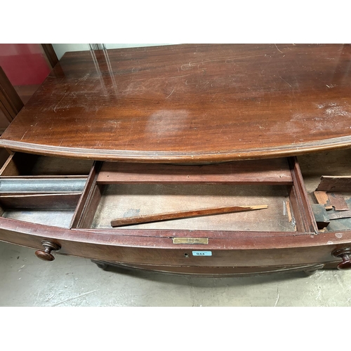 944 - A Victorian mahogany bow front chest of 4 drawers, top originally fitted as secretaire, turned handl... 