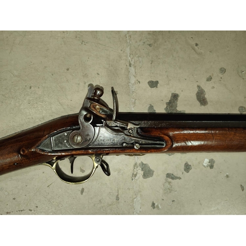 A late 18th/early 19th century flint lock musket, stamped ARCHER ...