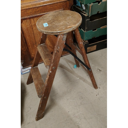 949 - A vintage library stool.